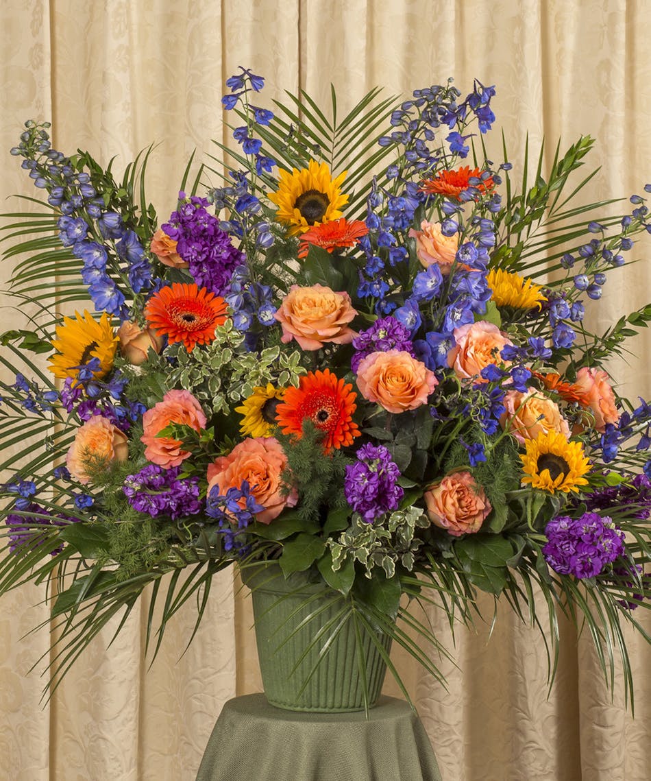 Vibrant Funeral Basket Danvers (MA) Currans Flowers